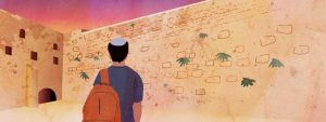 A young man in a yarmulke with a bag over his shoulder stares at a desert brick wall with a bright pink sunset in the background.